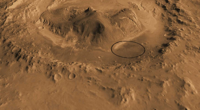 Kráter Gale na Marsu, se zakroužkovaným místem vrtání bahenního kamene. Zdroj: NASA


